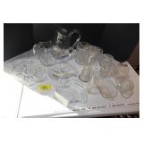 Glass pitchers, vases, etc