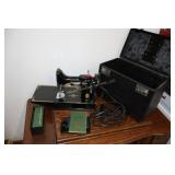 Antique Singer sewing machine in case