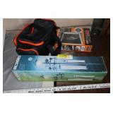 Weathervane lamp, mesh garage screen, toolbag