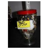 glass jar of buttons