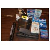 3 hole punch, moth balls, paint brushes