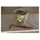 Nail puller & bucket of large nails