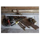 work light, bolt cutter, springs, saws