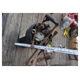 bucket of big wrenches, tire irons, can crusher