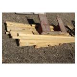 stack of 1x4x8's & saw horse