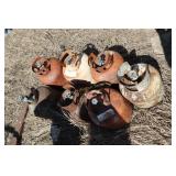 7 old propane tanks