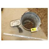 galvanized bucket,  chain and mirror