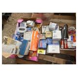 large assortment of filters and spark plugs