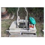 Bricks, sprinklers, Hose reel