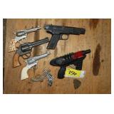 vintage toy guns one says Lone Ranger