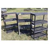3 black plastic shelves