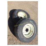 2 implement wheels with 15.5L16 tires