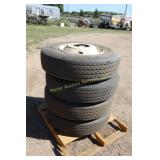 4 Tire recaps w/good tread on rims11R22.5