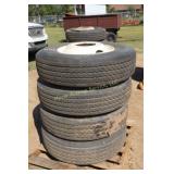 4 Tire recaps w/good tread on rims11R22.5