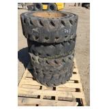 4 - Solid skidloader tires 10x16.5, 8 bolt