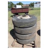 4 Tire recaps w/good tread on rims11R22.5