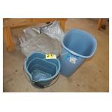 bucket, tarp and trash can
