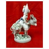 Llardo girl on donky figurine