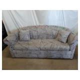 Upholstered Pull-Out Sofa Bed With Matching Throw