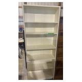 White melamine bookshelf