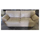Tan leatherette sofa