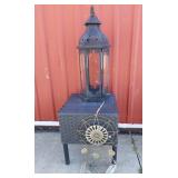 Wicker side table, decorative lantern and metal