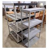 3 plastic shelves. 28" l x 15" w x 49 1/2" h &