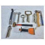 Wise Grips, adjustable wrenches, pry bar, axe,