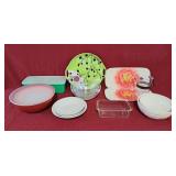 Assorted mixing bowls, platters, sifter, and
