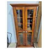 Petite wooden display cabinet