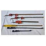 3 bar clamps, large Gray flat screw driver, and 2