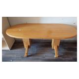 Rolling oval wood table