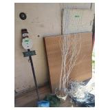 Christmas lights, snowman sign, garland, white