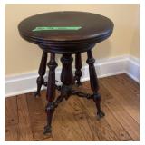 Wooden rotating piano stool with glass ball claw