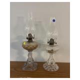 2 glass based oil lamps tallest 17in