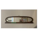 Oval wall Mirror with carved wood frame