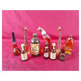 Collectible Avon bottles and empty bar ware booze