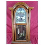 City 31 day wall clock. 26" h x 14" w