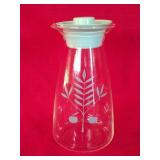 Pyrex glass carafe with a turquoise "Apple Tree"