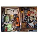 Apple peeler, magnifying glass, tools, batteries,