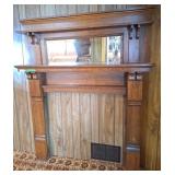 Wooden Fireplace mantle with mirror. Opening