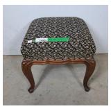 Victorian style carved footstool with cabroile
