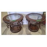 2 matching round glass top coffee tables with