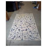 Floral area rug 62"W 97"L
