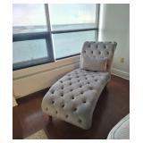 Grey velvet tufted chaise lounge with nail head