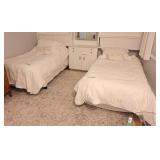 2 single sized beds with frames. Bedding
