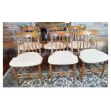 6 matching vintage dining room chairs with cane
