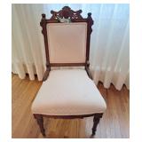 Vintage accent chair on castors