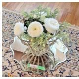 Mirrored display stand with faux floral plant