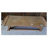 Intricate carved wooden coffee table with glass